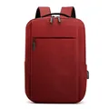 Burgundy business laptop backpack with USB charging port and durable fabric on white background - Red