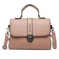 Oudroze kunstlederen crossbodytas met verticale riem en vintage metalen sluiting - Roze