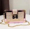 Bolso de fiesta rosa con purpurina con cierre dorado y correa de cadena para mujer - Rosa