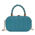 Light blue crossbody bag with vertical ribbed texture and gold twisted handle - Blue
