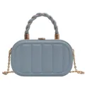 Light blue oval hard shell handbag with textured design and gold chain strap - Light Blue