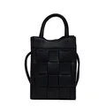 Modern black woven leather handbag with dual handles and adjustable crossbody strap - Black