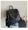 Black faux leather backpack with white lattice stitching and silver metal logo detail - Grid Stitching Style / Black
