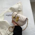 Chic cream white V-quilted small square crossbody bag with gold chain and ball detail - White