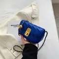 Royal blue quilted chain bag with gold metal lock and leather strap detail - Blue