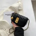 Black quilted leather crossbody bag with gold chain strap and metal ball detail - Black