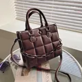 Dark brown checkered square handbag with silver hardware and decorative chain strap - Burgundy