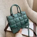 Dark green quilted tote bag with chunky chain strap and white stitching detail - Green