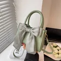Sage green mini square handbag with a large decorative mesh bow and detachable strap - Green