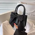 Mini black square handbag with large chiffon bow detail and round handles - Black