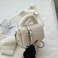 Chic cream white plush handbag with gold hardware and detachable leather shoulder strap - White