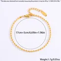 Détail du bracelet à billes dorées montrant la longueur 17cm plus 5cm et le poids 1.7g - Perles Rondes Dorées