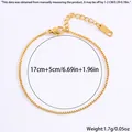 Vue détaillée du bracelet feuille dorée avec chaîne 17cm, extension 5cm et fermoir - Perle d'imitation dorée