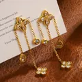 Gold titanium steel tassel earrings with clover motif and sparkling cubic zirconia stones - Clover Tassel Style / Gold