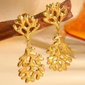 Boucles d'oreilles corail en acier inoxydable doré avec design ajouré élégant - Design corail / Corail Doré