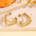 Élégantes boucles d'oreilles C dorées à double couche avec design torsadé - Double Couche Torsadé Doré