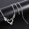 Silver punk hip hop necklace with hollow heart and flame pendant on black matte stand - Flame Heart Pendant (Snake Chain)