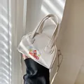Light beige retro crossbody bag with cute Christmas bear embroidery and leather texture - Off White