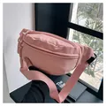 Roze canvas heuptas voor dames met geweven ritssluiting en een verstelbare schouderriem - Roze
