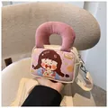 Chic canvas crossbody bag with cartoon girl print and pink corduroy handles - White