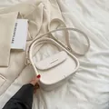 Chic off-white leather crossbody flap bag featuring Fashion & Bags logo for women - White