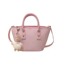 Pink woven bucket bag with long strap and cute doll pendant accessory in summer style - Pink