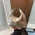 Light blue jacquard Hobo bag with traditional patterns and pearl sphere charms - Blue