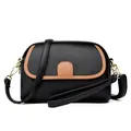 Borsa a tracolla da donna in pelle nera con finiture marroni e cerniere dorate - Nero