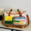 Reisetasche in Naturweiß mit orangefarbenen Reißverschlüssen für Yoga und Fitness - Gebrochenes Weiß