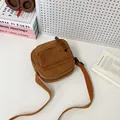 Minimalist brown corduroy crossbody bag with front pocket and adjustable shoulder strap - Brown