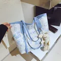 White large tote bag with light blue graffiti print and cute plush rabbit charm - With Pendant / Blue