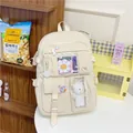 Minimalistischer cremeweißer Oxford-Rucksack mit Klarsichttaschen und Bärenanhänger - Beige