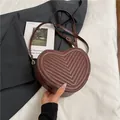 Chic brown heart-shaped striped crossbody bag for women with elegant quilted design - Brown