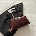 Vintage burgundy bowling handbag in matte faux leather with dual slim handles - No Pendant / Red