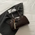 Dark brown glossy leather bowling bag with vintage wood bead charm for work wear - With Pendant / Coffee