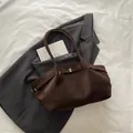 Large dark brown matte leather tote bag with gold metal buckle and double handles - Brown