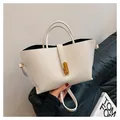Minimalist creamy white tote bag with lychee texture and golden metal lock - Off White