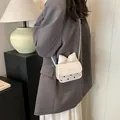 Mini sac bandoulière blanc à pois noirs avec un grand nœud décoratif élégant - Blanc