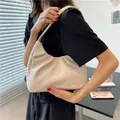 Fashionable cream white cloud-style shoulder bag featuring soft pleated faux leather - White