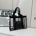 Transparent PVC tote bag with black strap and matching inner pouch minimalist style - Black