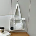 Minimalist transparent PVC tote bag in white with a matching inner zipper pouch - White
