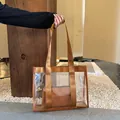 Transparent PVC tote bag with brown fabric handles and inner faux leather pouch - Brown