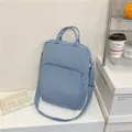 Blue large capacity oxford tote bag for tablets shown in a casual lifestyle setting - Blue