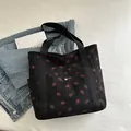 Black corduroy tote bag with strawberry print and front metal snap button pocket - Black