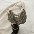 Schultertasche aus Leinen mit floralem Jacquard-Muster und Golddetails - Blau