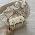 Chic cream box-shaped shoulder bag in faux leather with adjustable strap and top handle - White