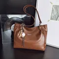 Large dark brown PU leather tote bag with fashion tag and baseball pendant charm - With Baseball Pendant / Brown