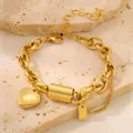 Bracelet en acier inoxydable doré avec maillons épais et pendentif en forme de cœur - Bracelet / Cœur Or avec Chaîne