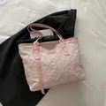 Pink tote bag with floral embroidery and textured fabric featuring leather handles - Pink Without Pendant