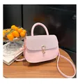 Detail of pink shoulder bag with glitter flap, golden U-lock and semi-circular handle - Pink